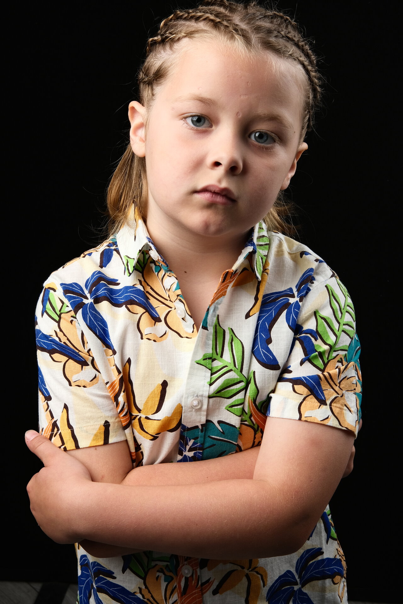 George Rouse confident pose with tropical print shirt